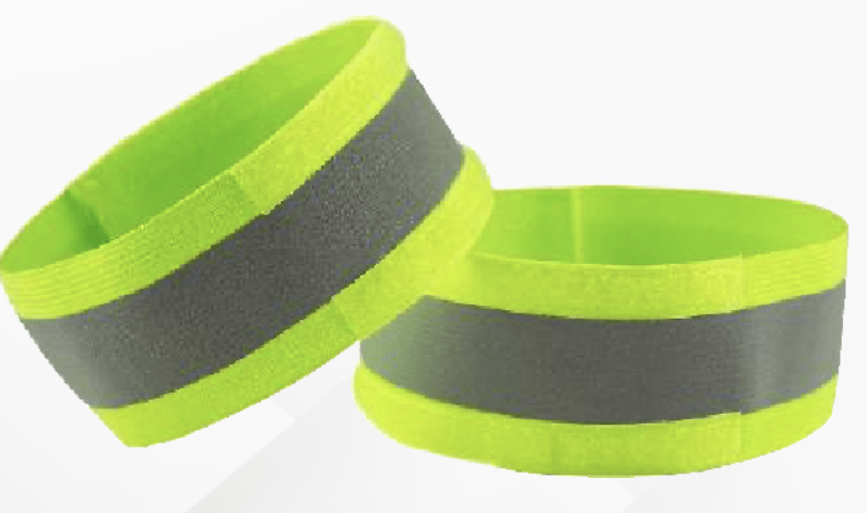 SafeKraft Reflective Arm Band SKRAB high visibility stretchable safety arm band with reflective material, Velcro closure, and Green and Orange color options.